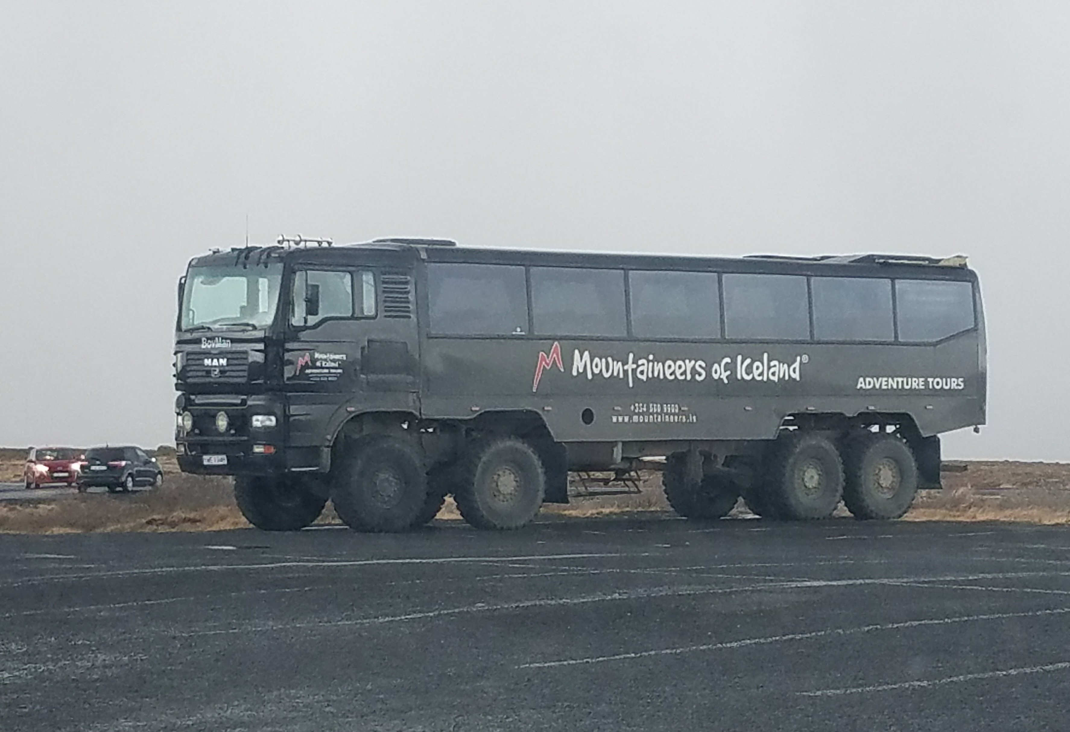 mountaineers of iceland adventure tour bus with giant winter wheels