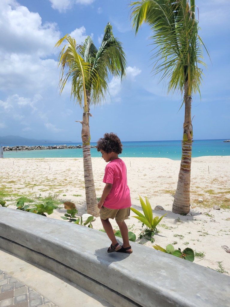 Beach walk at Harmony Beach Park in Montego Bay, Jamaica 