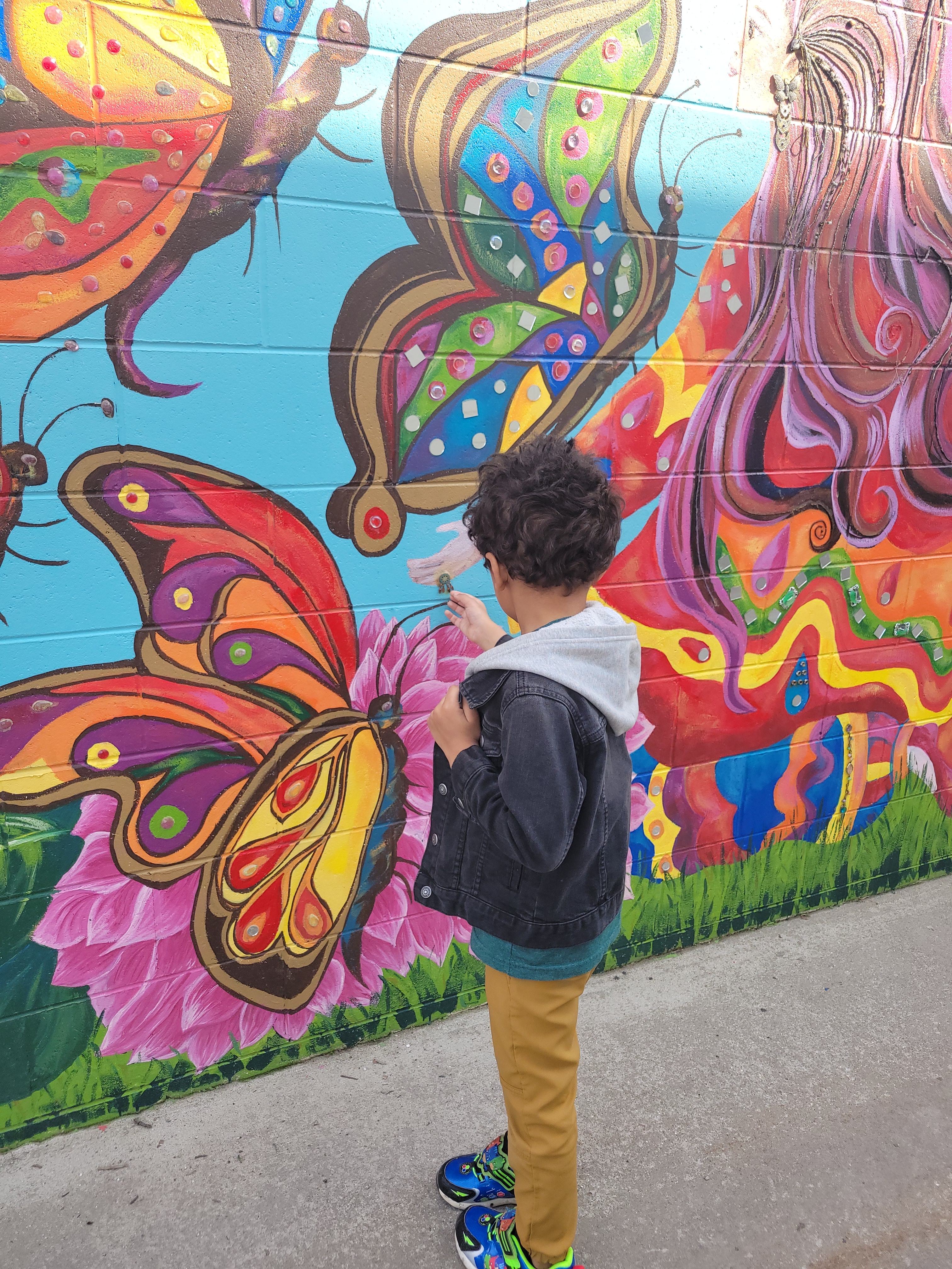 mural at art alley clare michigan